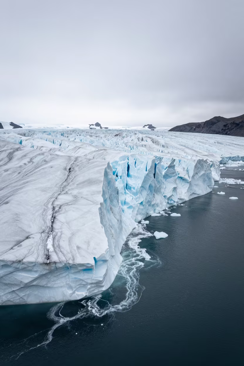 Iceland Glacier Tongue Calving Into Fjord in in Iceland