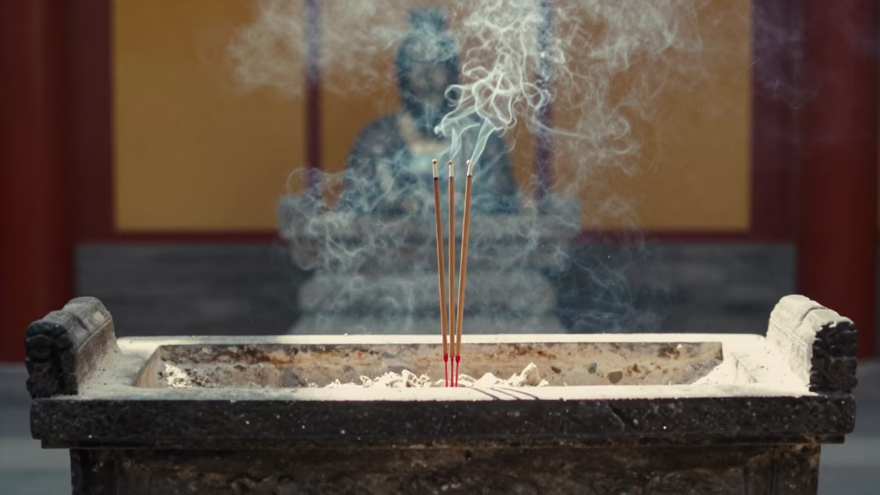 Incense Smoke Rising on Stone Altar at Sunrise in at the foot of a stone altar in Hohhot