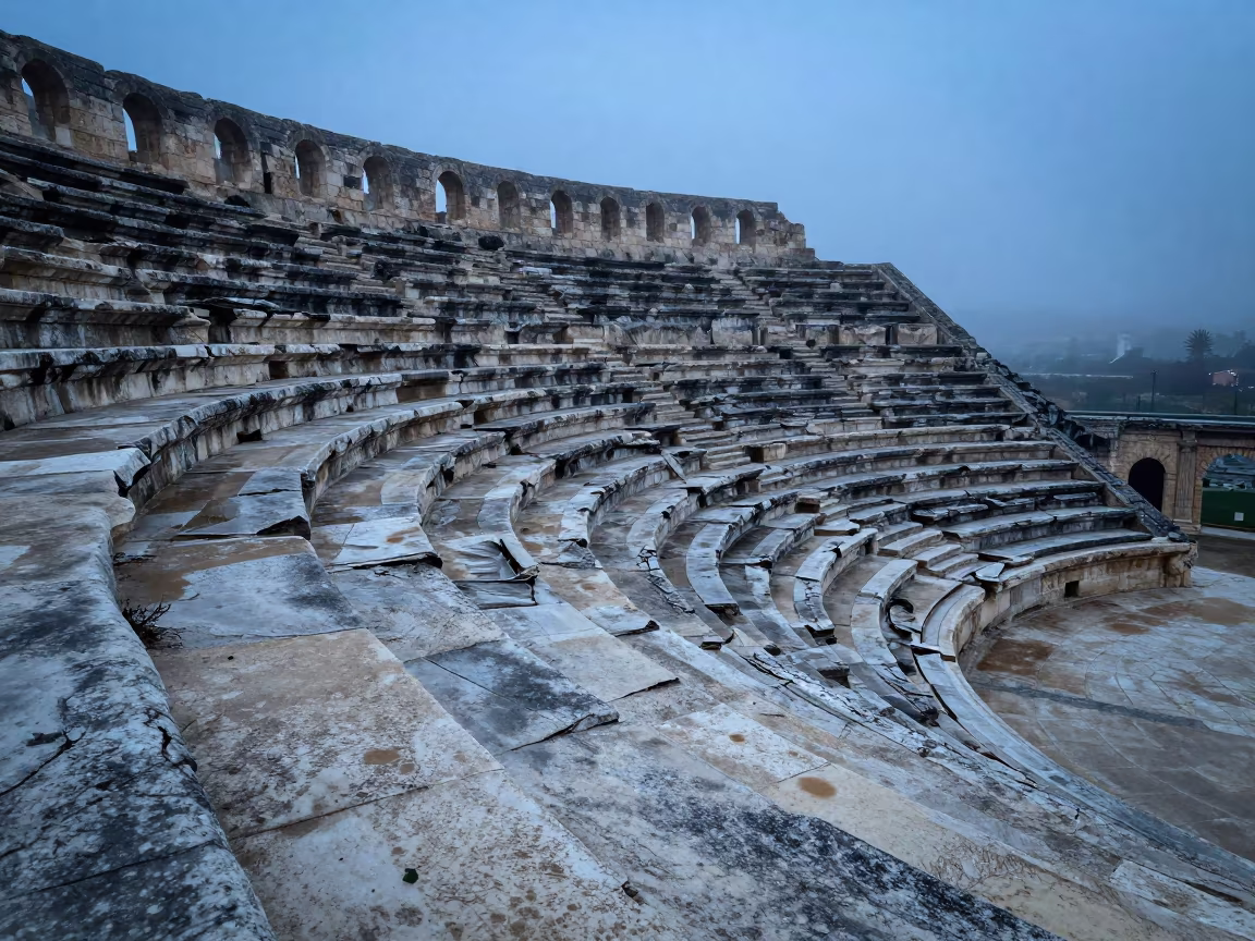 Indigo Twilight Over Crumbling Stone Amphitheater in inside a roofless nave near Sousse