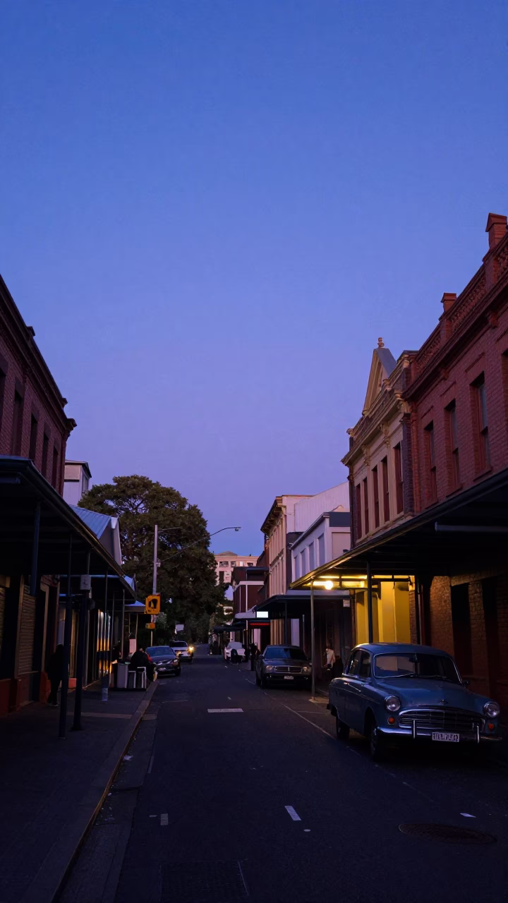 Indigo Twilight Melbourne Street Scene with Vintage Car and Damp Cobblestones in in Melbourne, Victoria, Australia