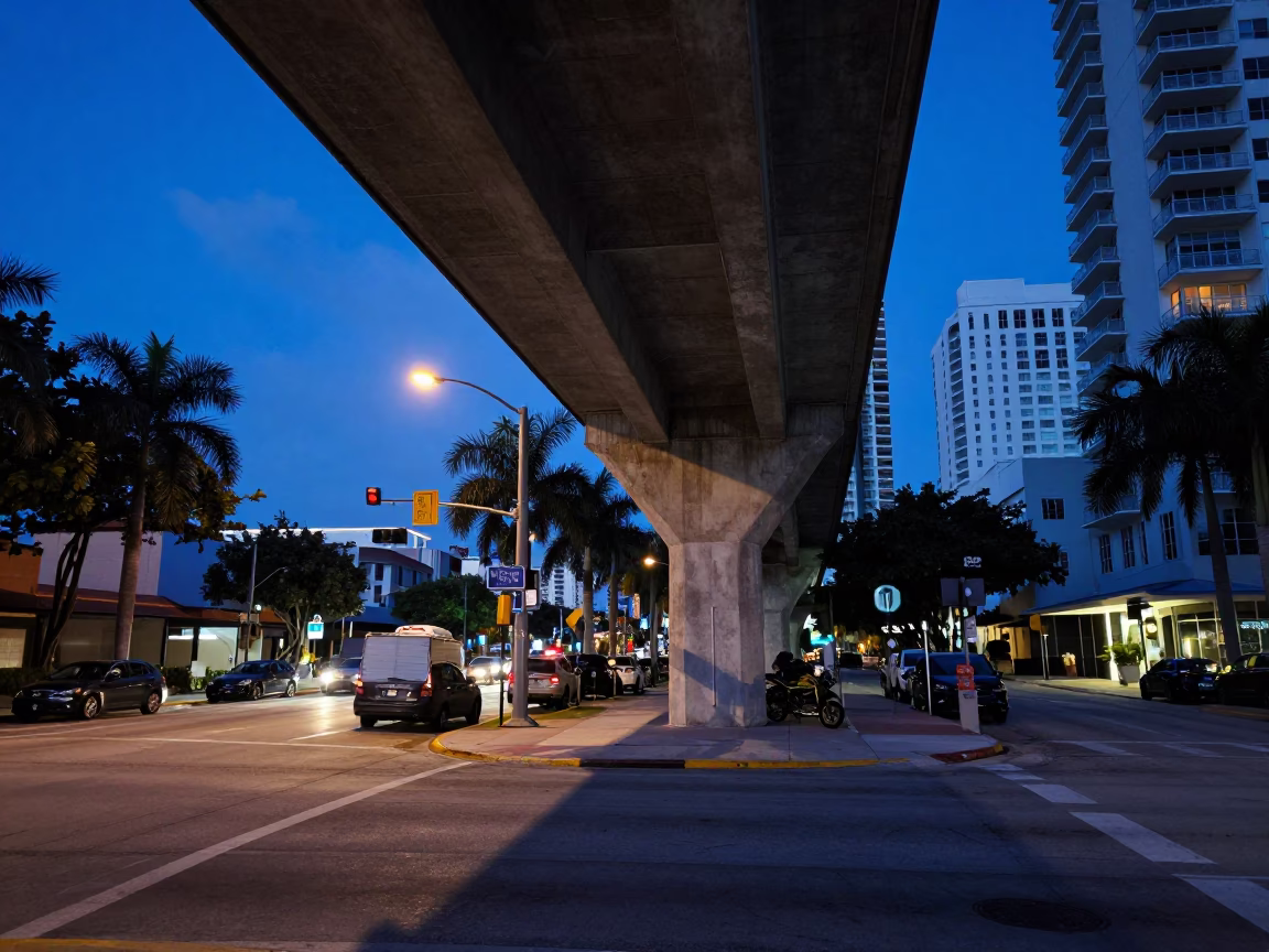 Indigo Twilight Miami Street Scene with Viaduct Shadow and Colorful Urban Activity in in Miami, Florida, United States
