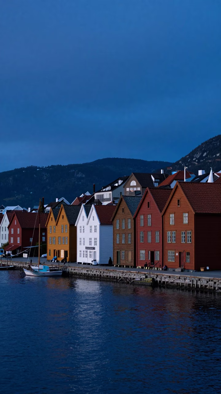 Indigo Twilight Over Bergen Norway Fjord and Historic Bryghen Wharf District in in Bergen, Norway