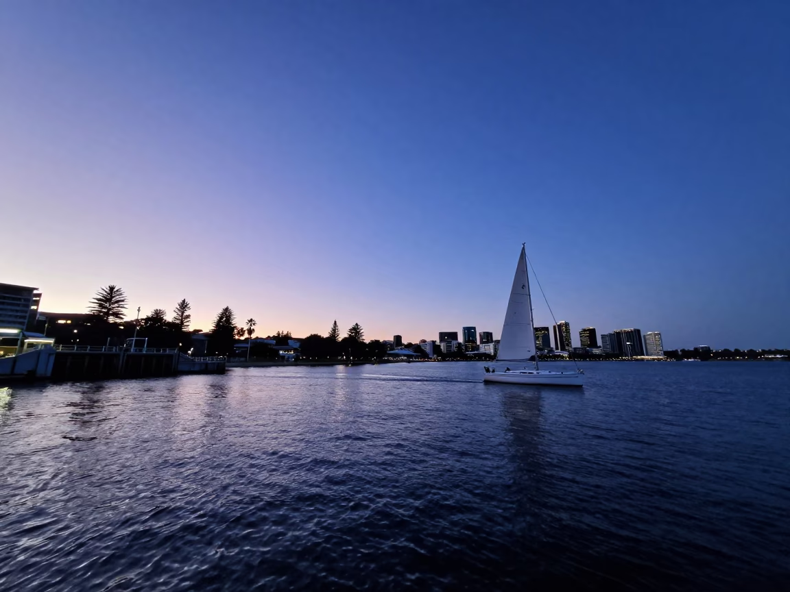 Indigo Twilight Over Perth Waterfront with Sailboat and Sluice Gate Details in in Perth, Western Australia, Australia