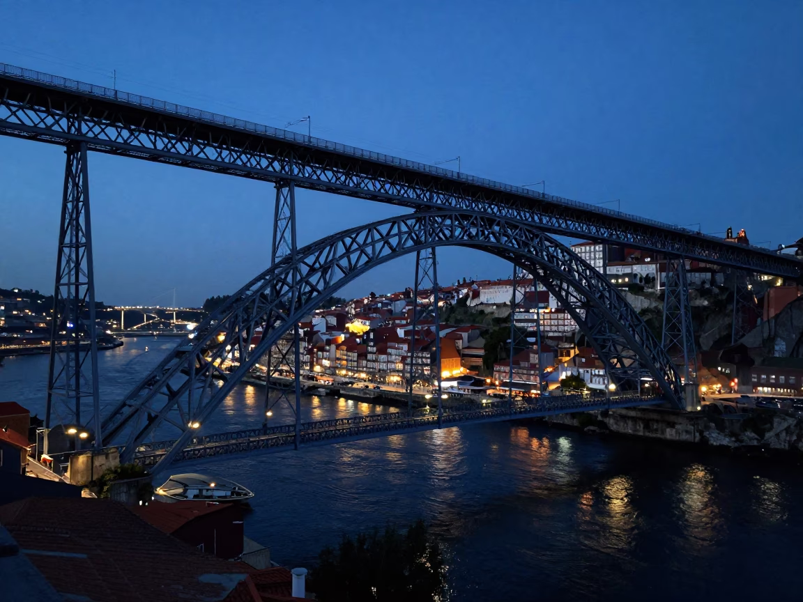 Indigo Twilight Over Porto's Dom Luis I Bridge With Night Train and City Lights in in Porto, Portugal