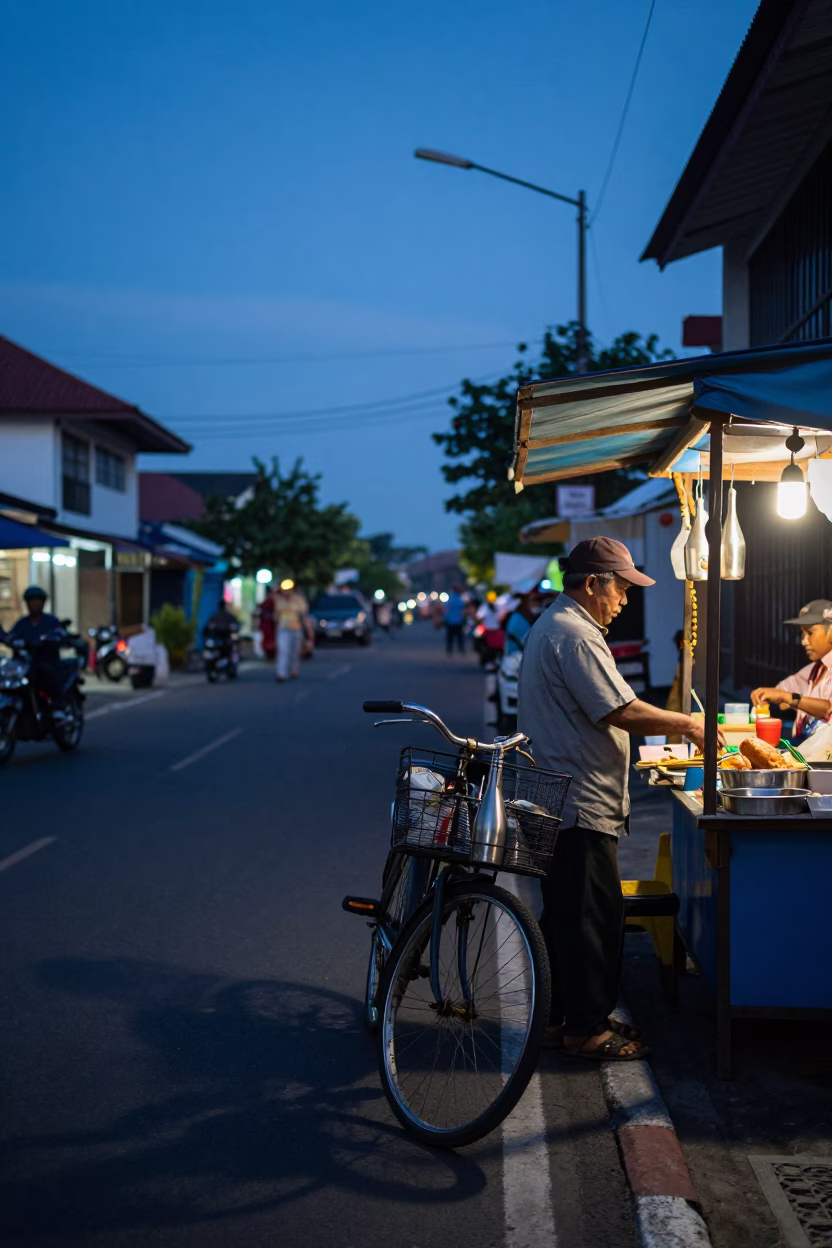 Indigo Twilight Street Scene in Denpasar Indonesia with Bicycle Basket and Steel Bottle in in Denpasar, Indonesia
