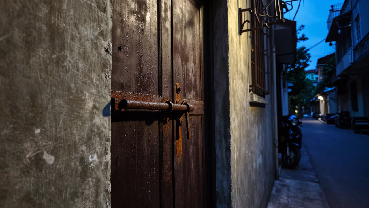 Indigo Twilight Street Scene in Hanoi Vietnam with Condensation on Door Latch in in Hanoi, Vietnam