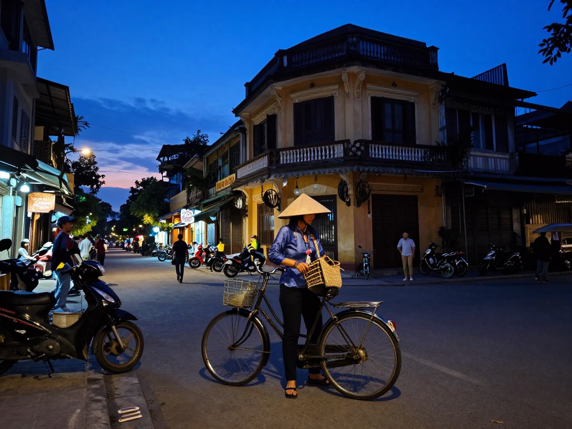 Indigo Twilight Street Scene in Hanoi Vietnam with Vintage Cycles and Local Commerce in in Hanoi, Vietnam