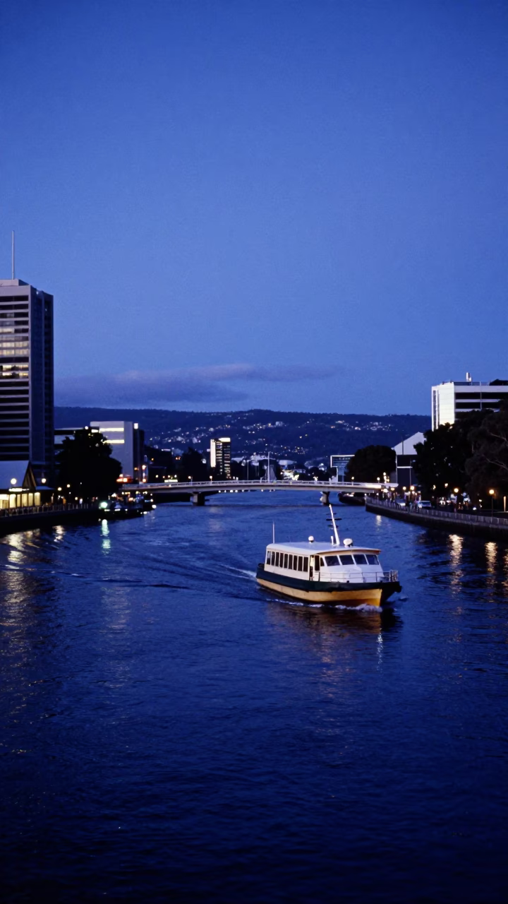 Indigo Twilight Street Scene in Hobart Tasmania with Water Taxi and Canal Houseboats in in Hobart, Tasmania, Australia