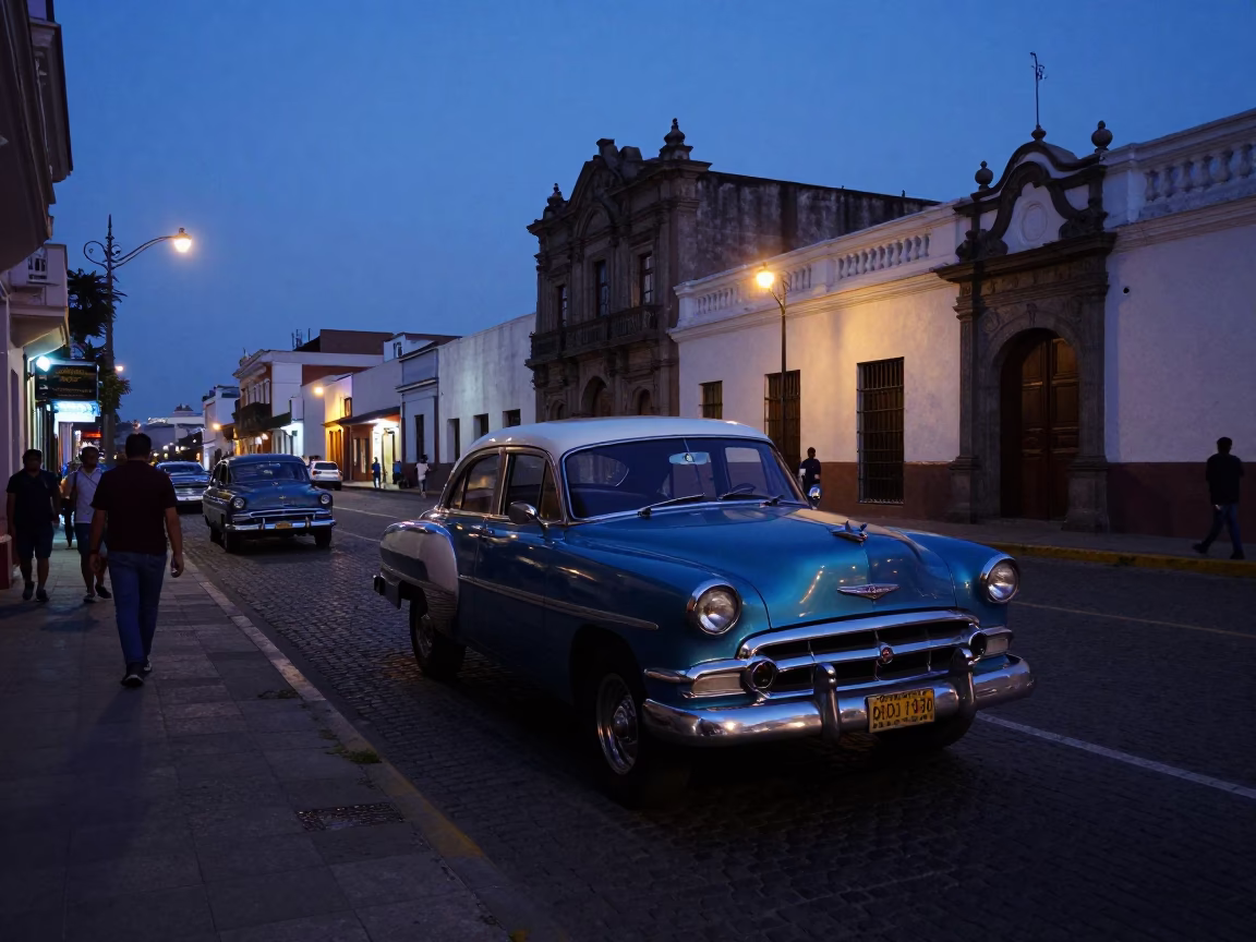 Indigo Twilight Street Scene in Lima Peru with Vintage Car and Pedestrians in in Lima, Peru