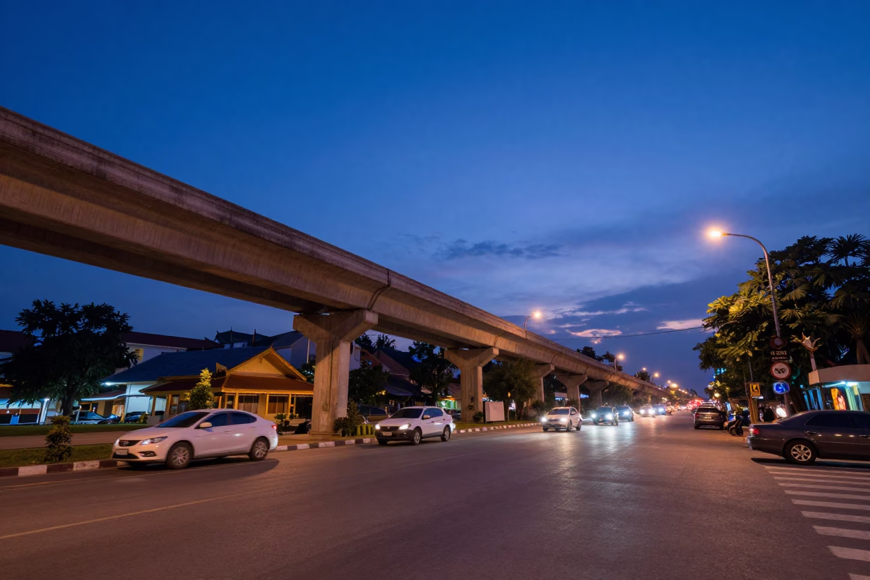 Indigo Twilight Street Scene in Phnom Penh Cambodia with Highway Flyover and River Traffic in in Phnom Penh, Cambodia