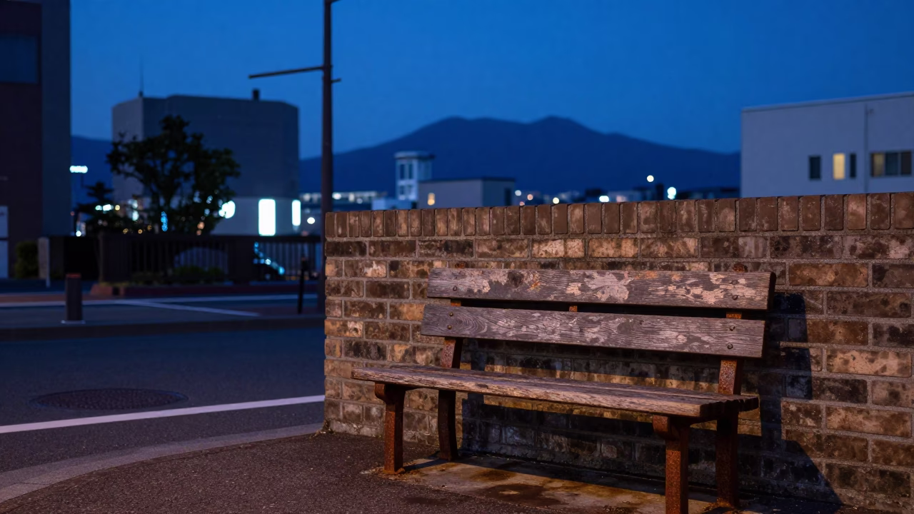 Indigo Twilight Street Scene in Sapporo Japan with Rusty Bench and Glowing Lantern in in Sapporo, Japan