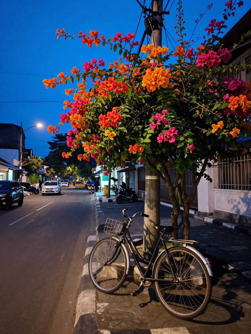 Indigo Twilight Street Scene in Surabaya Indonesia with Bicycle and Flowering Plant in in Surabaya, Indonesia