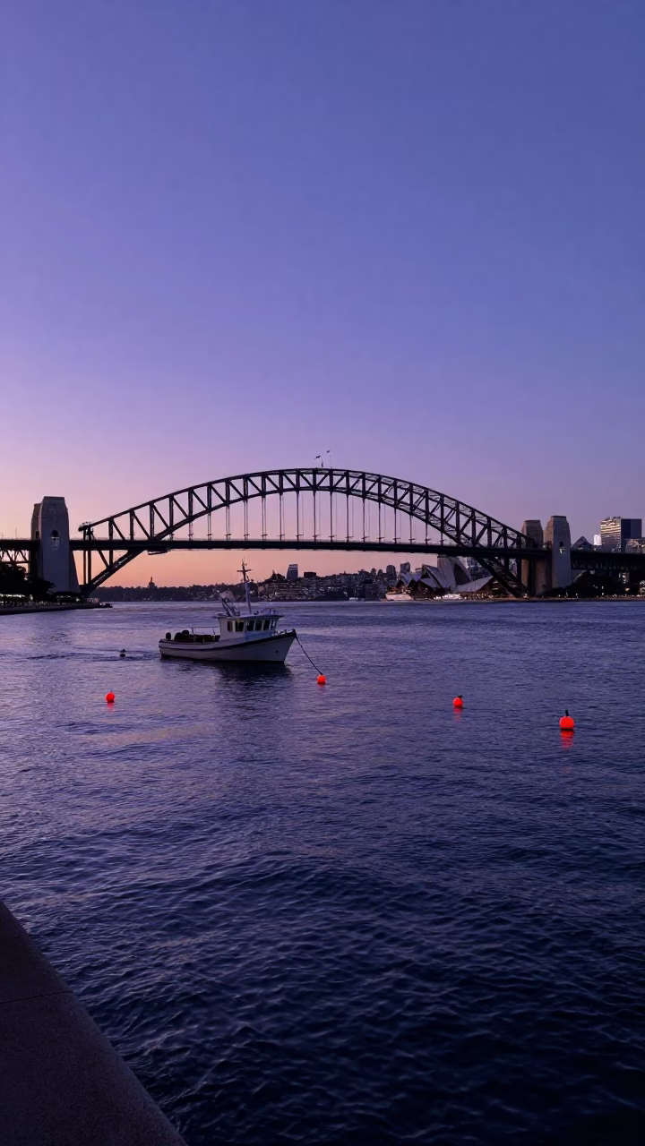 Indigo Twilight Sydney Harbour Bridge Fishing Floats and Water Taxi in in Sydney, New South Wales, Australia
