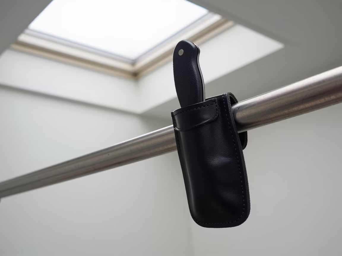 Insulation Knife Pouch on Pier Railing in on a pier railing in Aba