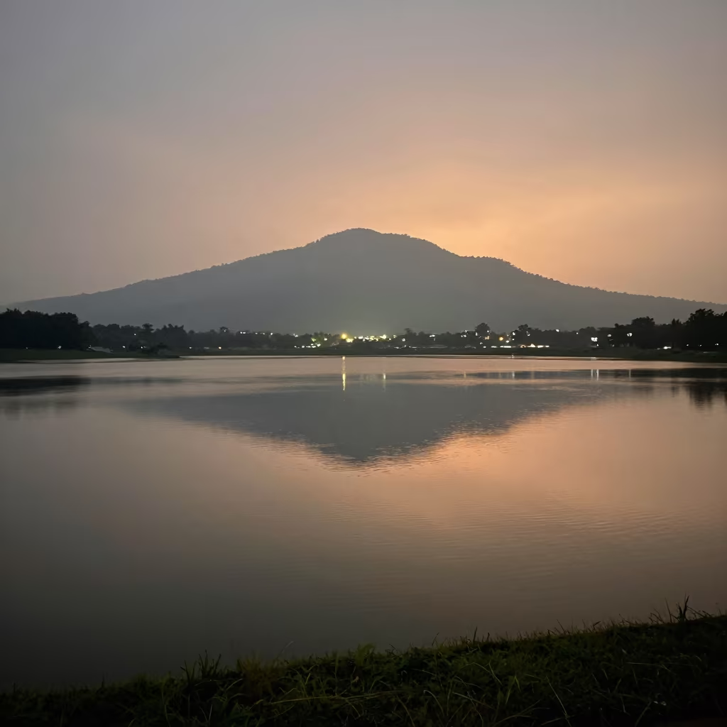 Inverted Mountain Reflection in Glacial Lake Floodplain in across a floodplain after rain in Bangladesh