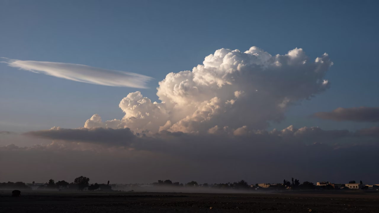 Iridescent Cloud Beside Cumulus Tower Dawn in near Khemisset