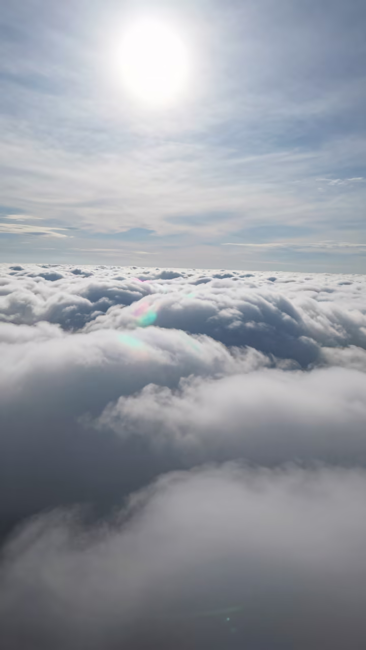 Iridescent Cloud Over Kerala Thunderheads at Noon in over a horizon of stacked thunderheads in Kerala