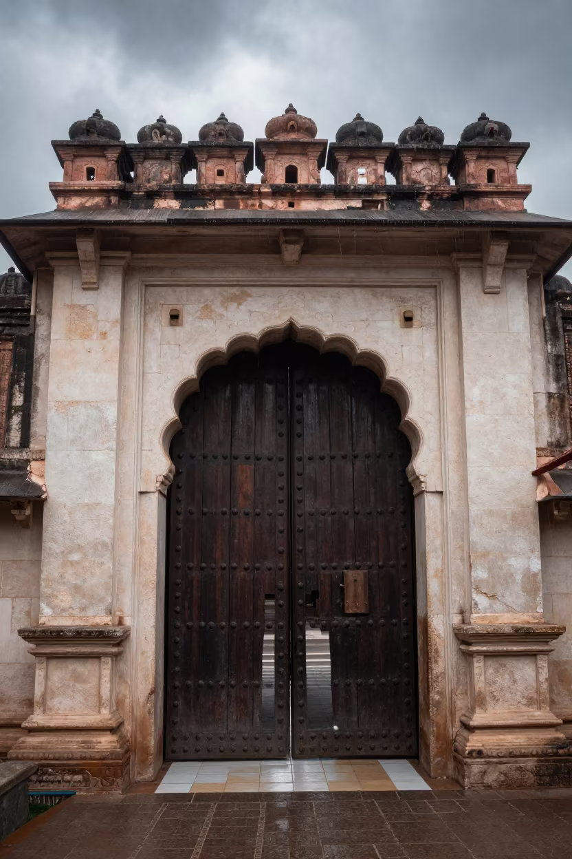 Iron-Studded Oak Gate in Thanjavur Dawn Hall in inside a tiled stair hall in Thanjavur