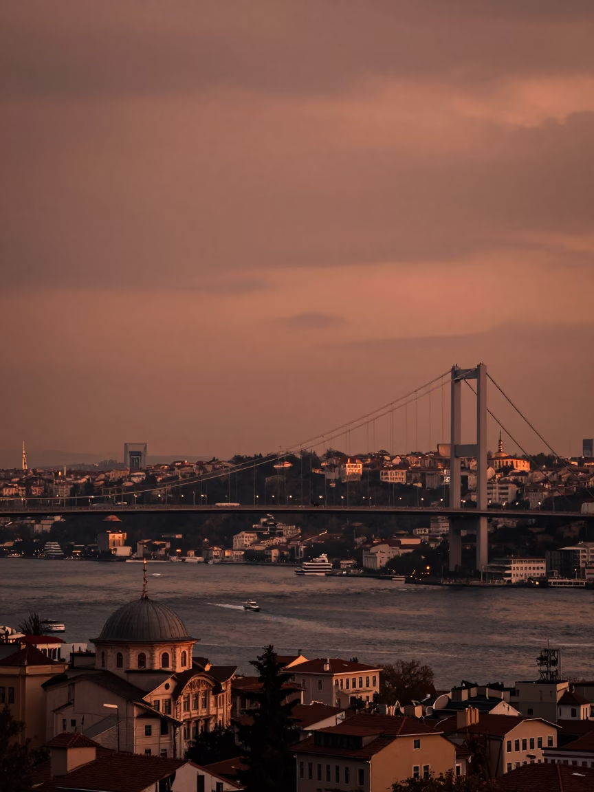 Istanbul Copper Dusk View of Bosphorus Bridge and Traditional Wooden Ferry Boat in in Istanbul, Turkey