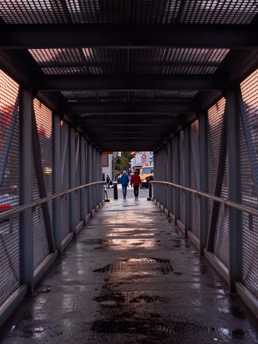 Istanbul Turkey Early Evening Pedestrian Overpass Perforated Metal and Wet Footsteps in in Istanbul, Turkey