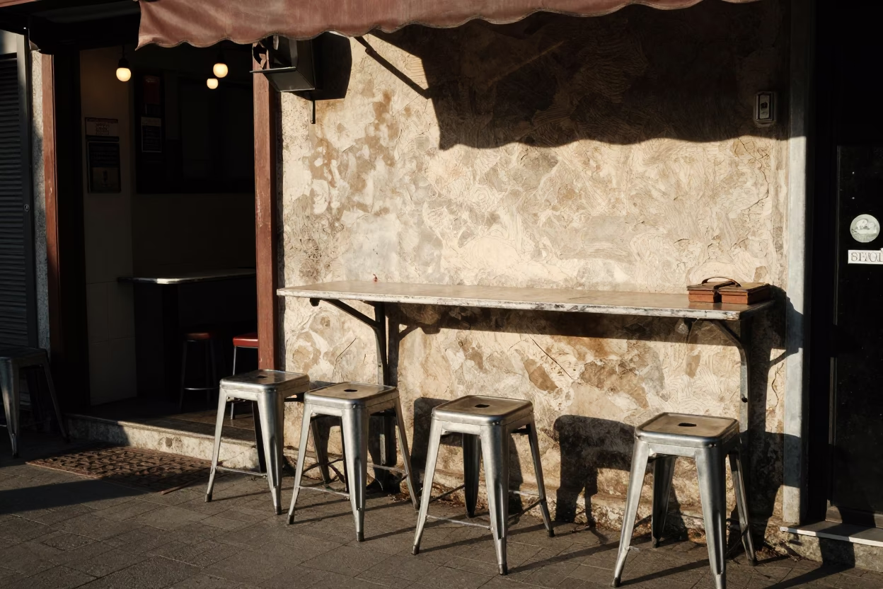 Istanbul Turkey Late Afternoon Street Scene with Metal Stools and Wicker Shadows on Plaster in in Istanbul, Turkey