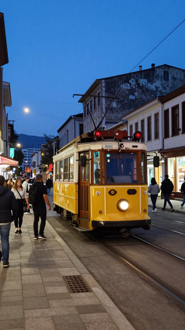Izmir Turkey Blue Hour Street Scene with Tram and Local Interaction in in Izmir, Turkey