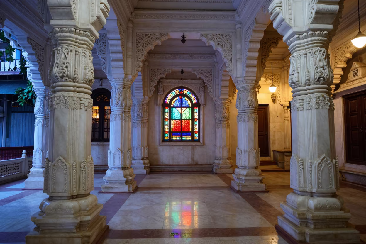 Jain Temple Interior Marble Filigree Stained Glass in in a chapel lit by stained glass in Sovabazar, Kolkata
