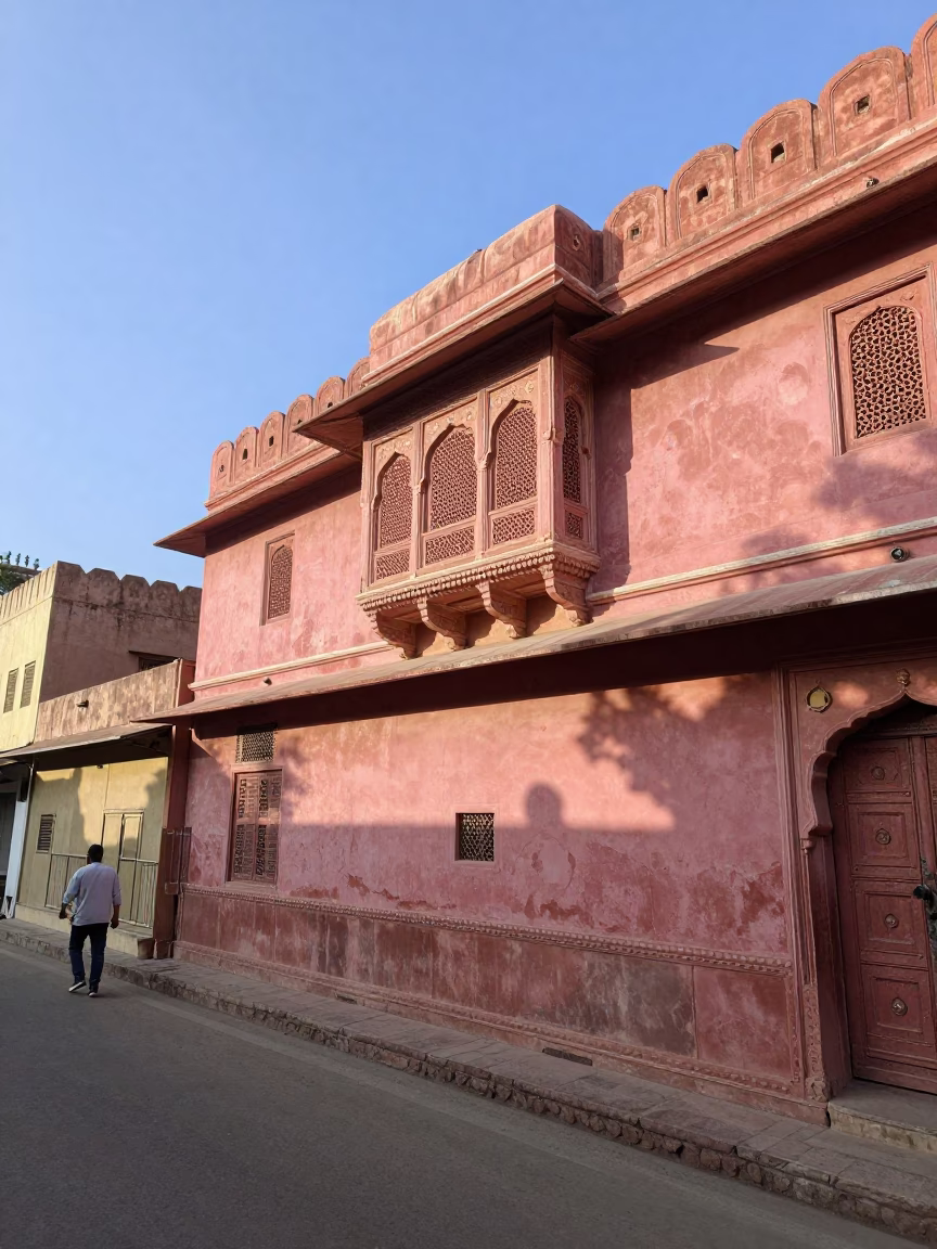 Jaipur India Late Afternoon Street Scene with Pink Sandstone Architecture and Local Market Activity in in Jaipur, India