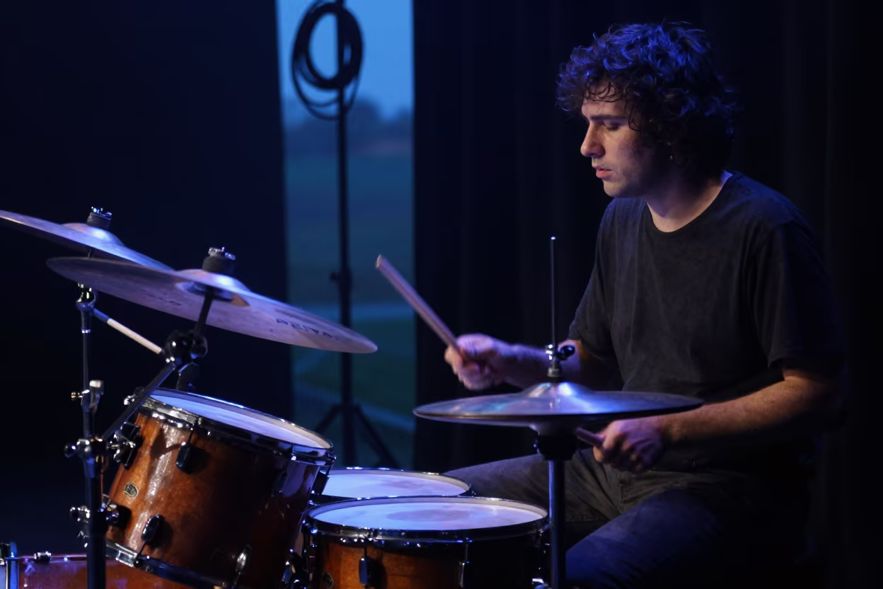 Jazz Drummer Rim Light Victoria Falls Stage in on a dimly lit stage in Victoria Falls