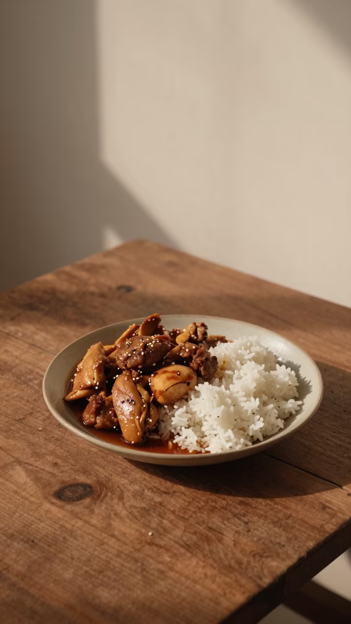 Jerk Chicken Platter with Rice on Wooden Table in on a rustic wooden table in Kunming