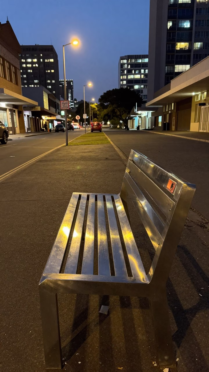 Johannesburg Street Scene at Dusk with Brushed Steel Bench and Glass Tumblers in in Johannesburg, South Africa
