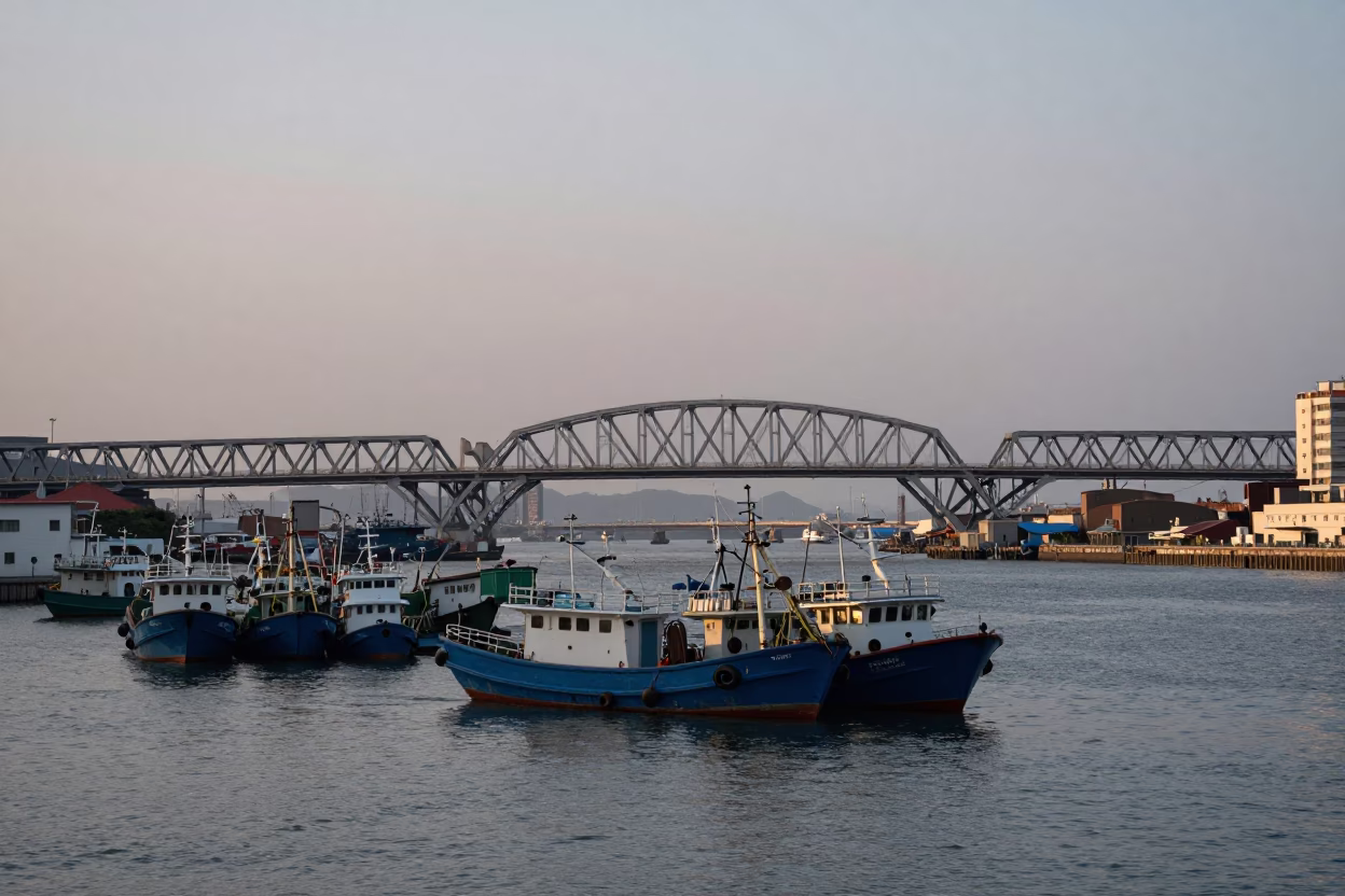Kaohsiung Harbor Early Evening Steel Bridge and Fishing Boats Realistic 1980s Photography in in Kaohsiung, Taiwan