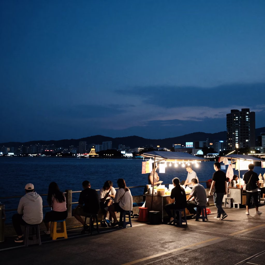 Kaohsiung Harbor Twilight Street Scene with String Lights and Local Dining in in Kaohsiung, Taiwan