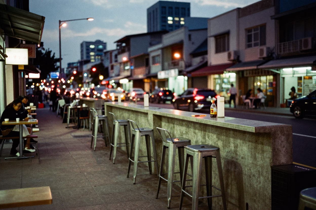 Kaohsiung Street Scene at As City Lights Begin To Glow in in Kaohsiung, Taiwan