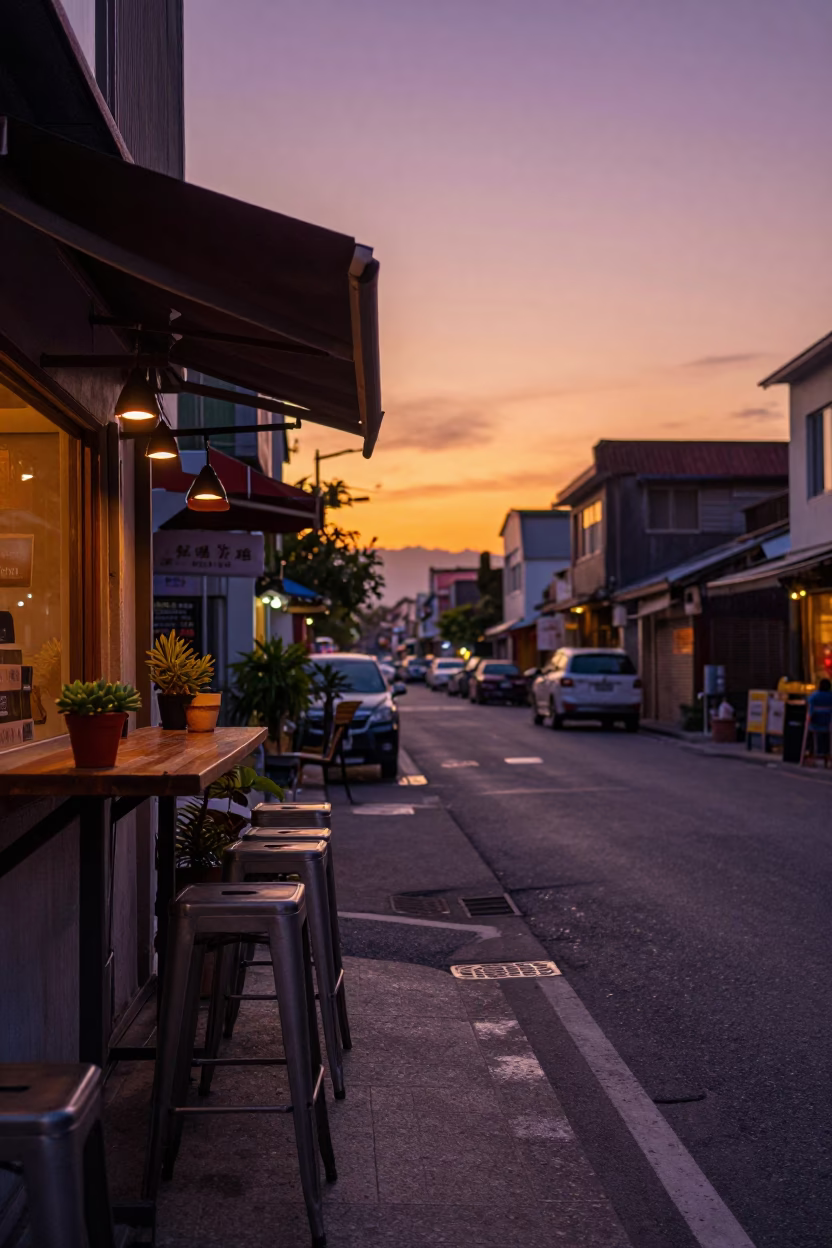 Kaohsiung Sunset Street Scene with Bar Stools and Succulents at Dusk in in Kaohsiung, Taiwan