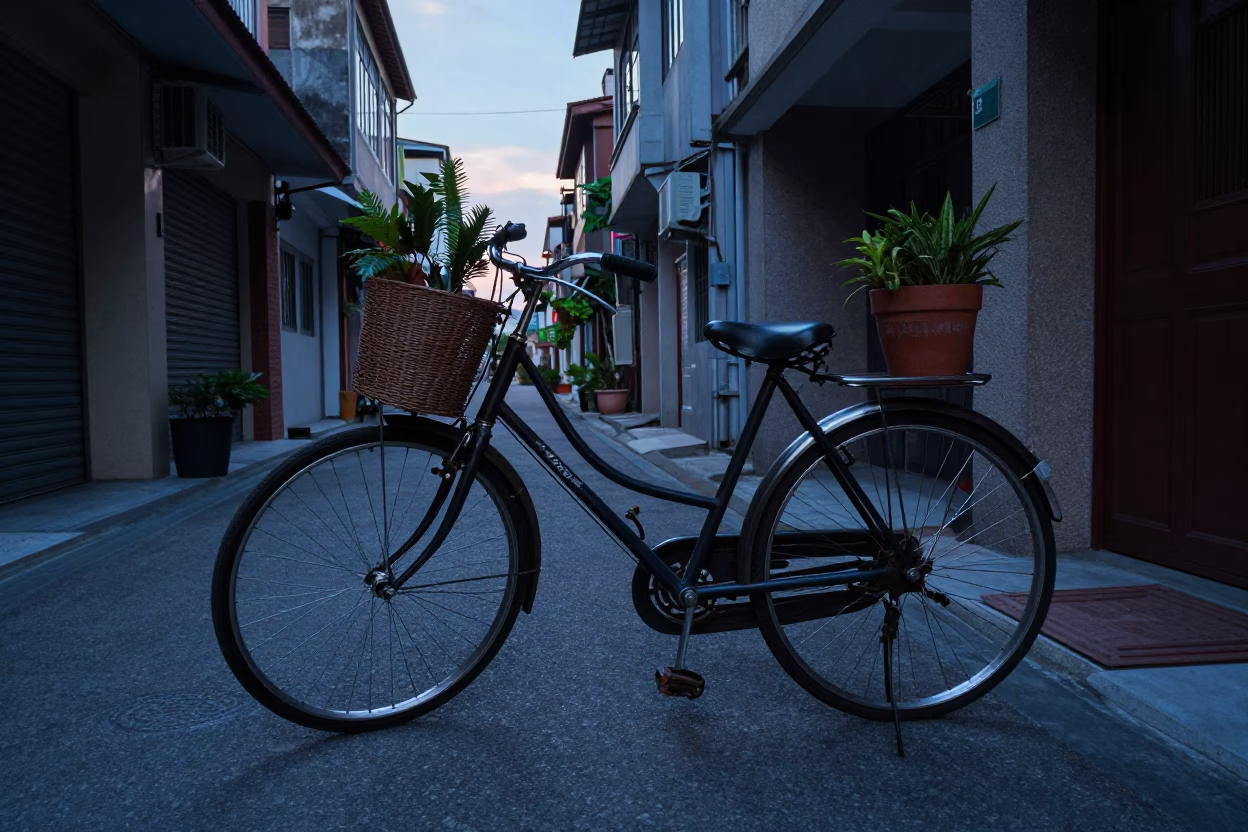 Kaohsiung Taiwan first light dawn street scene with vintage bicycle and flowerpot in in Kaohsiung, Taiwan