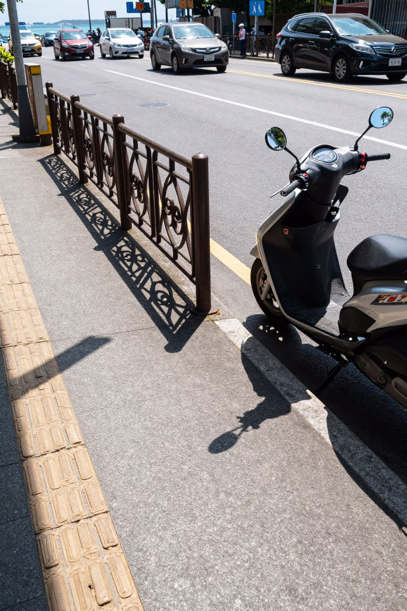 Kaohsiung Taiwan Street Scene with Wicker Shadow and Motorcycle in Midmorning Light in in Kaohsiung, Taiwan