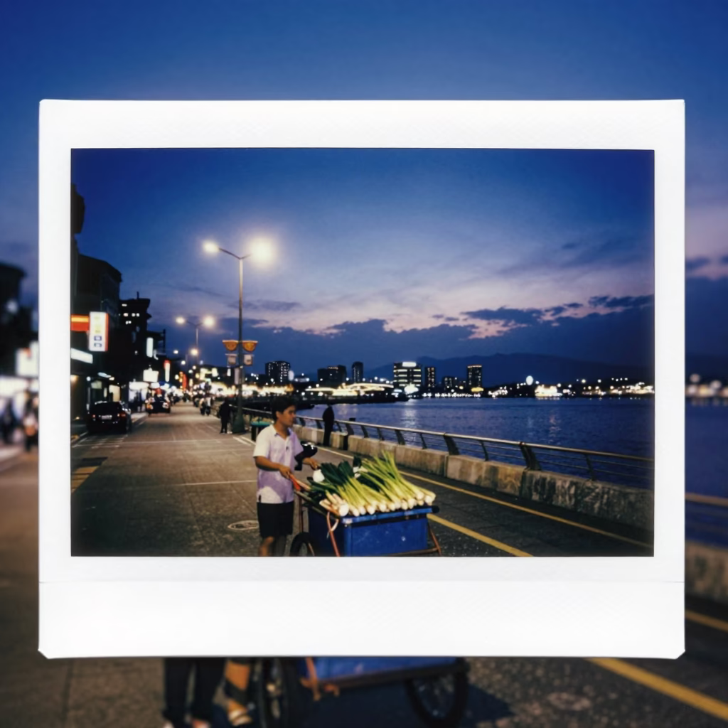 Kaohsiung Twilight Street Scene with Dusk Lights and Urban Activity in in Kaohsiung, Taiwan