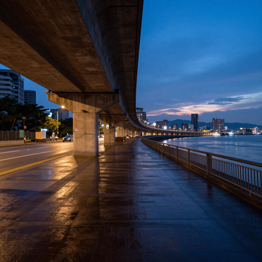 Kaohsiung Twilight Street Scene with Flyover Shadows and River Light in in Kaohsiung, Taiwan