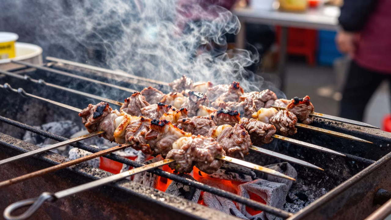 Kebab Grilling Over Coals at Wenzhou Market in at a fish market counter near Wenzhou