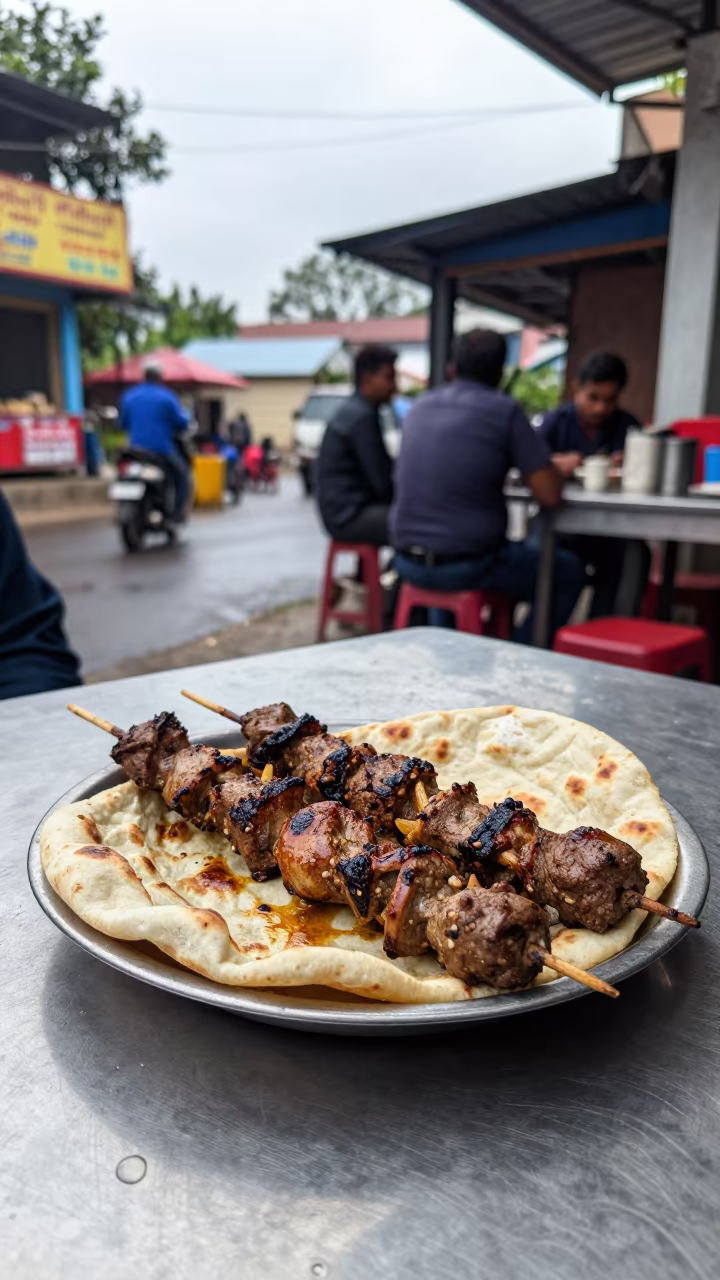 Kebab Koobideh on Lavash at Ulhasnagar Diner in at a roadside diner table in Ulhasnagar