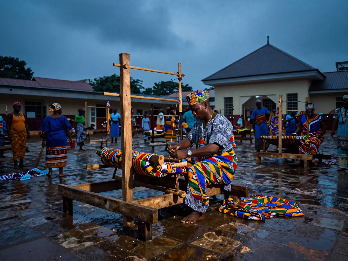 Kente Weaver at Twilight in Lagos Courtyard in in a temple courtyard in Lagos