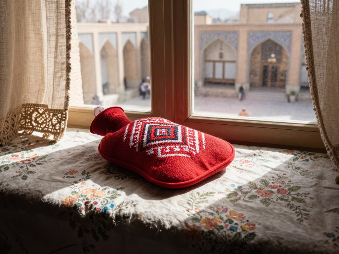 Knitted hot water bottle on window seat Isfahan in on a window seat near Isfahan