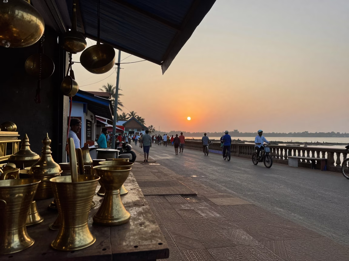 Kochi Fort evening street scene with brass utensils and ferry boats at sunset in in Kochi, India