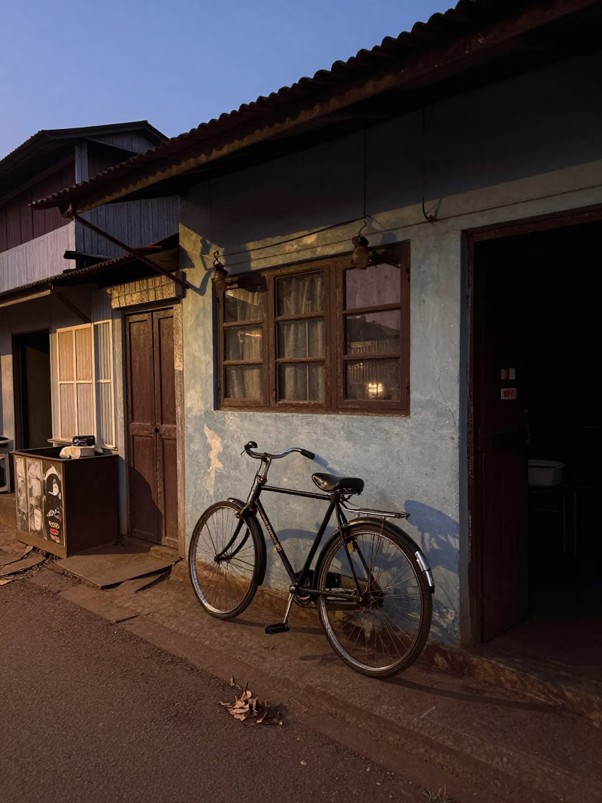 Kochi India Early Evening Street Scene with Bicycle and Local Shopfront in in Kochi, India