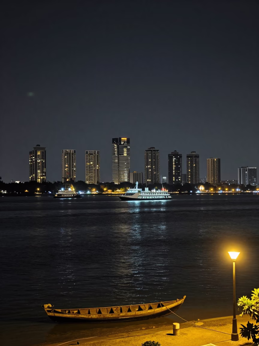 Kochi India Night Skyline Overbackwater Ferries and Illuminated High Rises in in Kochi, India