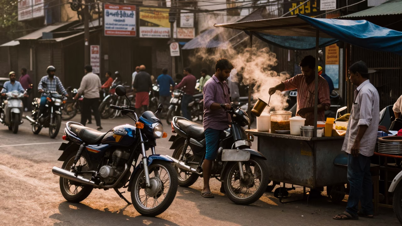 Kolkata Evening Street Scene with Motorcycle and Local Vendor Under Honeyed Light in in Kolkata, India