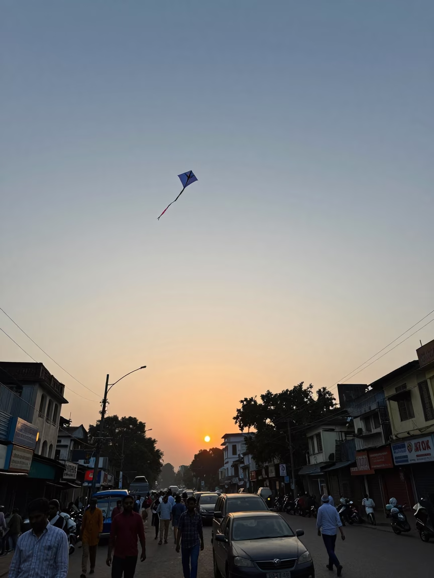 Kolkata India Street Scene with Kites Flying Near Horizon at Sunset in in Kolkata, India