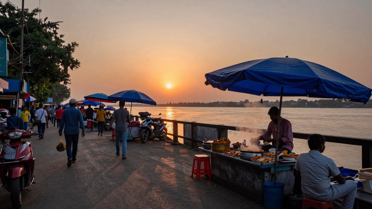Kolkata Street Scene at Sunset with Local Vendors and Colorful Umbrellas in in Kolkata, India