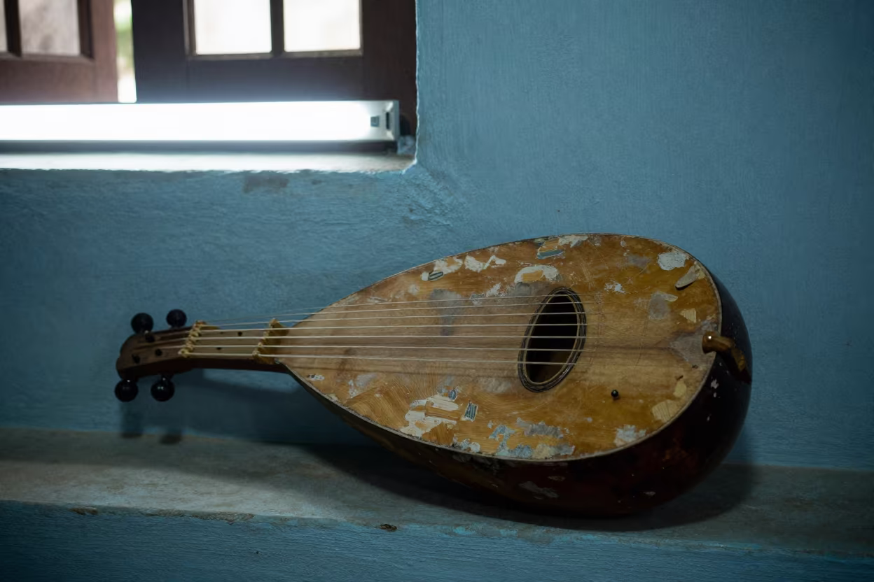 Kora Instrument Display Ledge Near Bissau in on a painted display ledge near Bissau